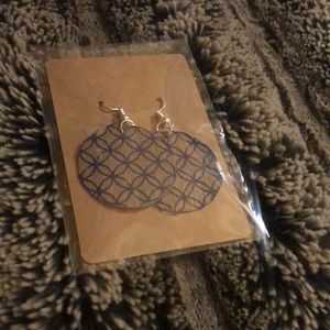 Homemade wooden earrings in navy